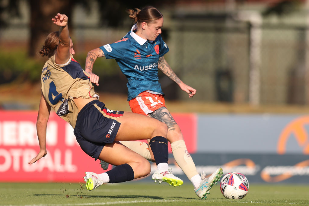 NEWCASTLE, AUSTRALIA - DECEMBER 21: Natasha Prior of the Jets competes for the ball with Sharn Freier of the Roar during the round seven A-League Women's match between Newcastle Jets and Brisbane Roar at No. 2 Sports Ground, on December 21, 2024, in Newcastle, Australia. (Photo by Scott Gardiner/Getty Images)