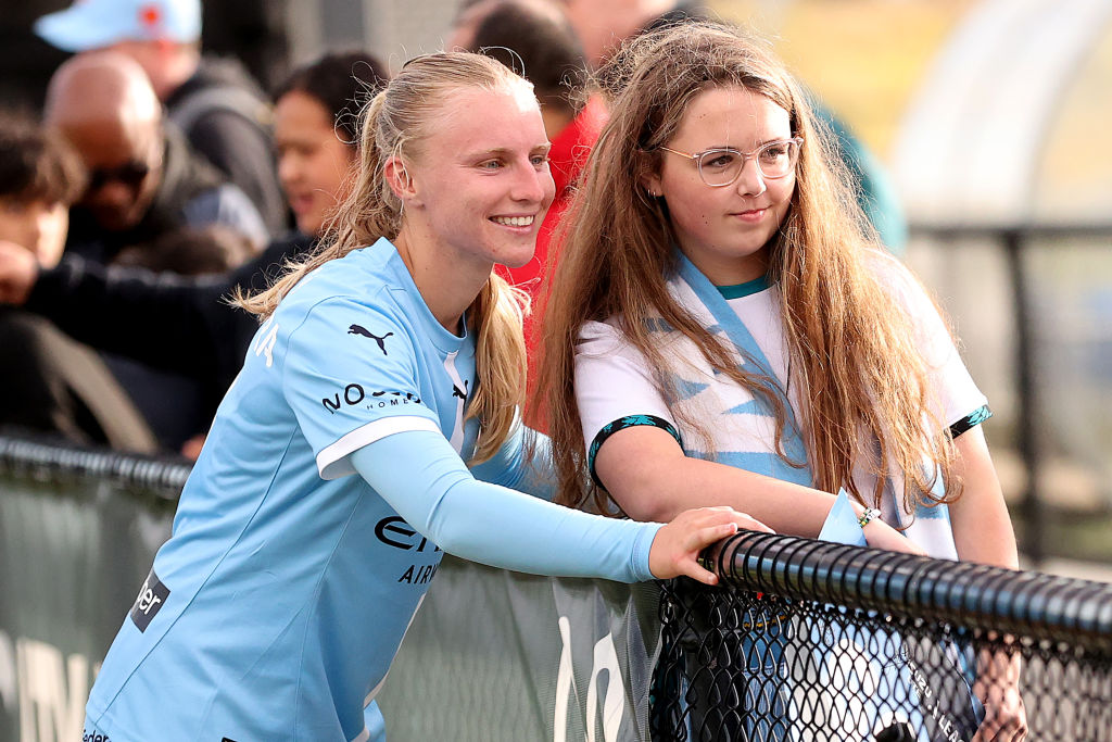 MELBOURNE, AUSTRALIA - DECEMBER 28: Holly McNamara of Melbourne City meets fans during the round eight A-League Women's match between Melbourne City and Wellington Phoenix at City Football Academy, on December 28, 2024, in Melbourne, Australia. (Photo by Kelly Defina/Getty Images)