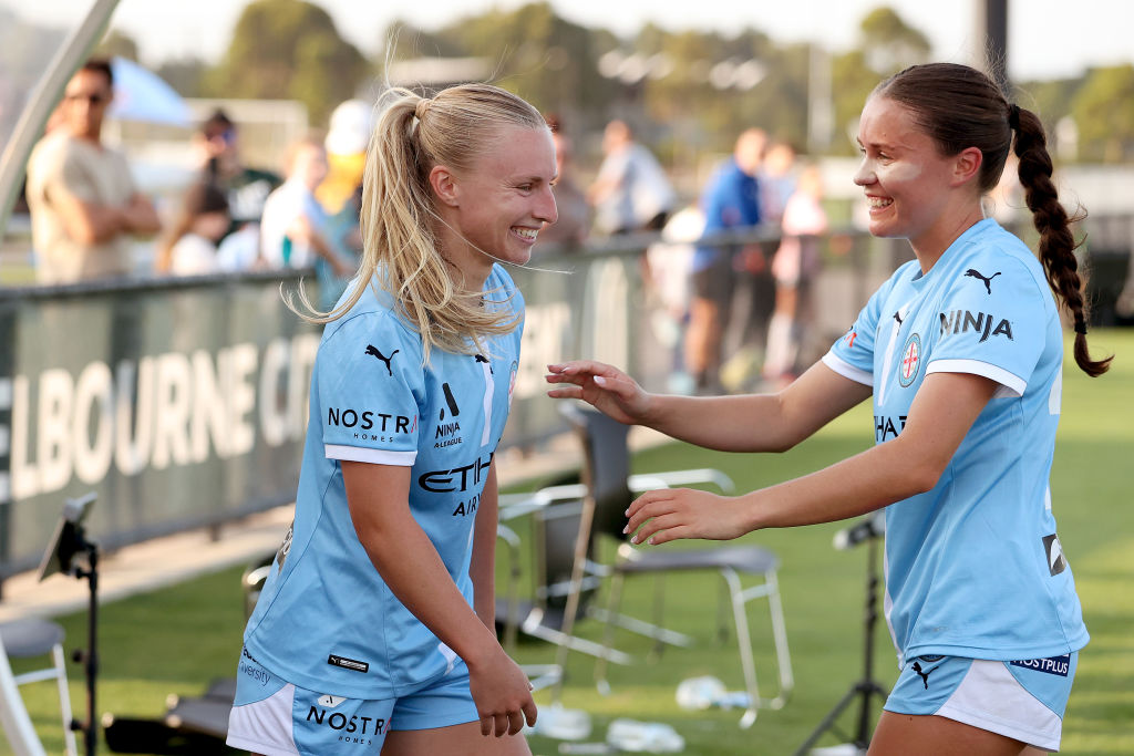 MELBOURNE, AUSTRALIA - FEBRUARY 05: Holly McNamara of Melbourne City celebrates the win with Bryleeh Henry of Melbourne City during the round 20 A-League Women's match between Melbourne City and Western United at ctr:cyber Pitch, on February 05, 2025, in Melbourne, Australia. (Photo by Kelly Defina/Getty Images)