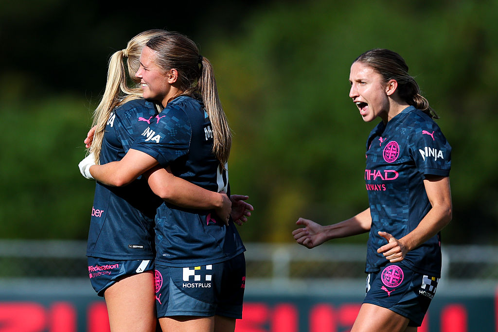 WELLINGTON, NEW ZEALAND - MARCH 30: L to R, Holly McNamara of Melbourne City celebrates with Leticia McKenna and Leah Davidson after scoring a goal during the round 21 A-League Women's match between Wellington Phoenix and Melbourne City at Porirua Park, on March 30, 2025, in Wellington, New Zealand. (Photo by Hagen Hopkins/Getty Images)