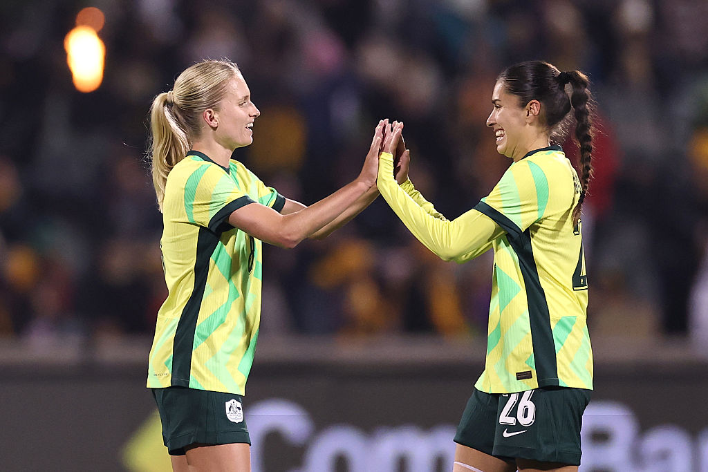 CANBERRA, AUSTRALIA - JUNE 02: Kaitlyn Torpey and Isabel Gomez of Australia celebrate winning the International Friendly match between Australia Matildas and Argentina at GIO Stadium on June 02, 2025 in Canberra, Australia. (Photo by Cameron Spencer/Getty Images)