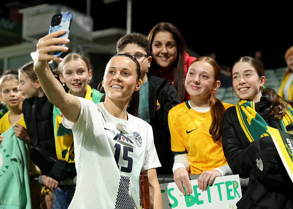 PERTH, AUSTRALIA - JUNE 26: Hayley Raso of the Matildas takes selfie with fans during the International Friendly match between Australia Matildas and Slovenia at HBF Park on June 26, 2025 in Perth, Australia. (Photo by Janelle St Pierre/Getty Images)