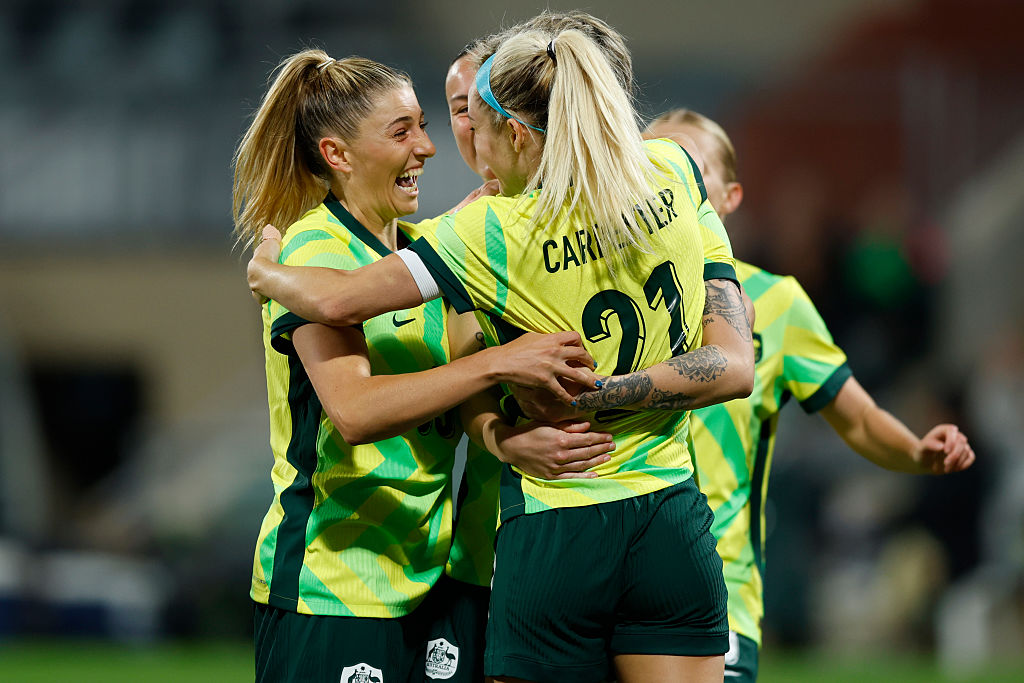 PERTH, AUSTRALIA - JUNE 29: Remy Siemsen of the Matildas celebrates with the team after a goal from Michelle Heyman of the Matildas during the International Friendly match between Australia Matildas and Slovenia at HBF Park on June 29, 2025 in Perth, Australia. (Photo by James Worsfold/Getty Images)