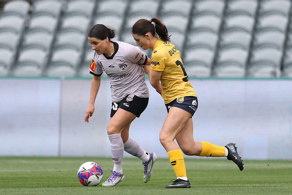 GOSFORD, AUSTRALIA - NOVEMBER 02: Adriana Taranto of Adelaide United with the ball und pressure from Kaiya Buchanan of the Mariners during the round one A-League Women match between Central Coast Mariners and Adelaide United at Polytec Stadium, on November 02, 2025, in Gosford, Australia. (Photo by Scott Gardiner/Getty Images)