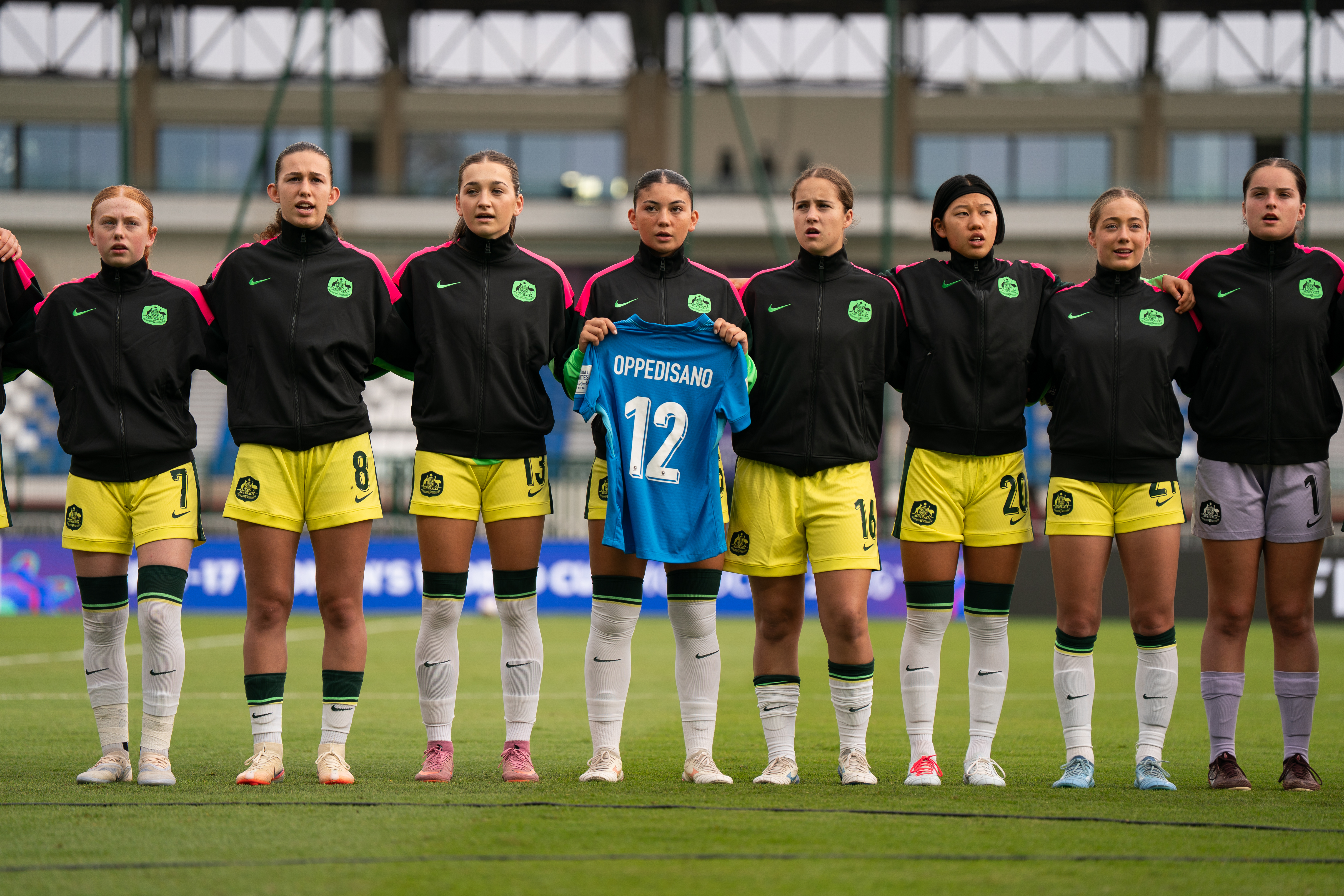 Rubi Sullivan holds up Alyse Oppedisano's jersey ahead of Australia's game against Spain at the FIFA U-17 Women's World Cup™. (Photo: Nairi Dilanchian/Football Australia)