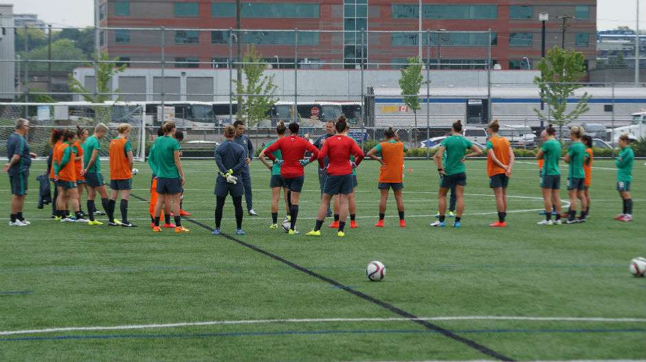 Coach Alen Stajcic imparts some tactical advice on the squad.