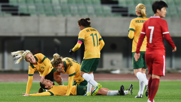 The Westfeild Matildas celebrate Emily van Egmond's late equaliser against China.