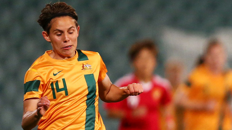 Ash Sykes on the ball against China.