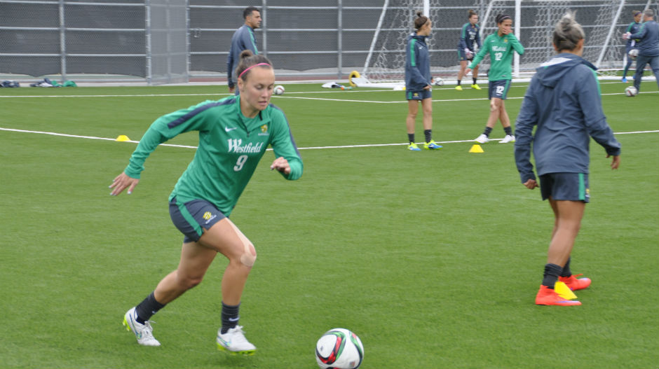 Striker Caitlin Foord goes for a dart.