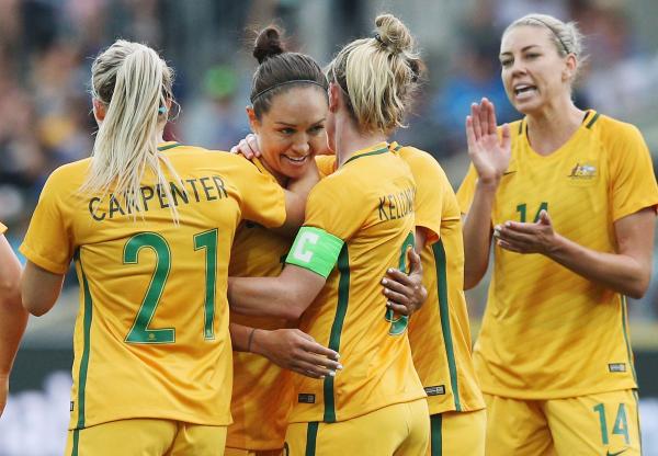 Kyah Simon celebrates her audacious goal in the first half
