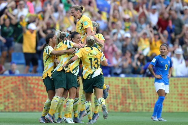 The Matildas celebrate as Chloe Logarzo’s cross-turned-shot levels the scores at 2-2