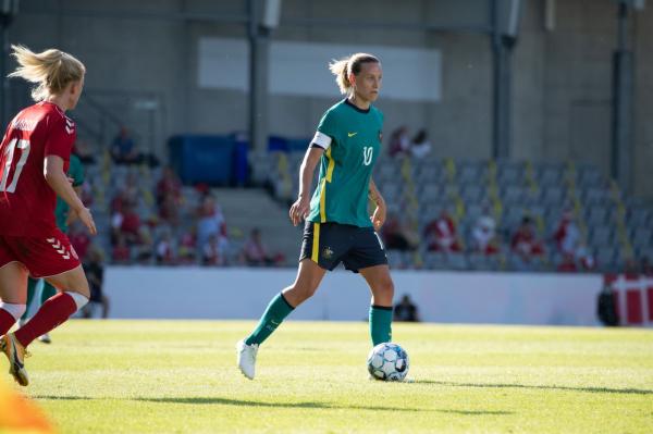 Emily van Egmond on the ball in her 100th game 