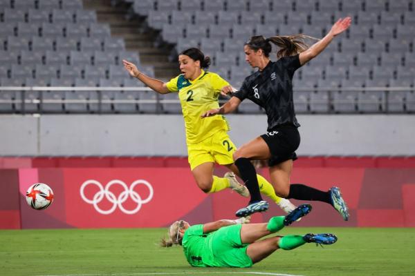 Sam Kerr evades Erin Naylor and Abby Erceg at the Olympics 