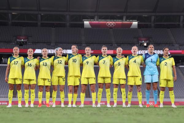 the Matildas line up for the national anthem at the Olympics 