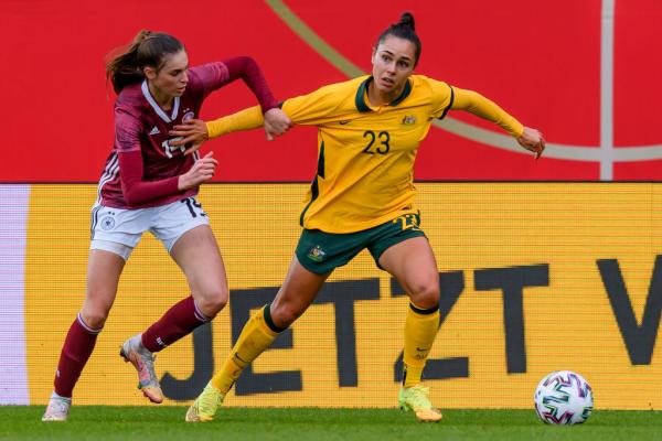 Emma Checker shields the ball v Germany 