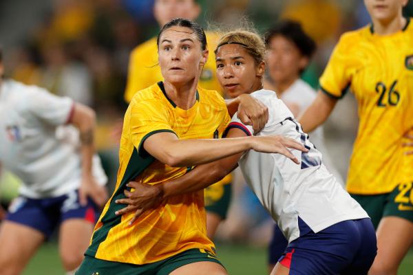 MELBOURNE, AUSTRALIA - DECEMBER 04: Emily Gielnik of Australia and Tseng Yun-Ya of Chinese Taipei compete during the International Friendly match between Australia Matildas and Chinese Taipei at AAMI Park on December 04, 2024 in Melbourne, Australia. (Photo by Daniel Pockett/Getty Images)