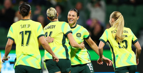 PERTH, AUSTRALIA - JUNE 26: Emily Gielnik of Australia celebrates with teammate Alanna Kennedy after scoring the teams first goal during the International Friendly match between Australia Matildas and Slovenia at HBF Park on June 26, 2025 in Perth, Australia. (Photo by Paul Kane/Getty Images)