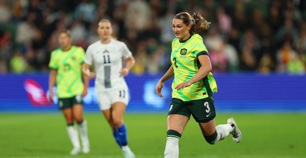 PERTH, AUSTRALIA - JUNE 29: Winonah Heatley of Australia runs with the ball during the International Friendly match between Australia Matildas and Slovenia at HBF Park on June 29, 2025 in Perth, Australia. (Photo by Paul Kane/Getty Images)