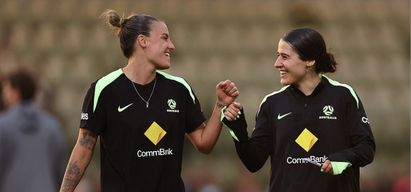 Chloe Berryhill and Adriana Taranto share a momentduring a Matildas training session at Sam Kerr Football Centre on July 01, 2025 in Perth, Australia. (Photo by Paul Kane/Getty Images)