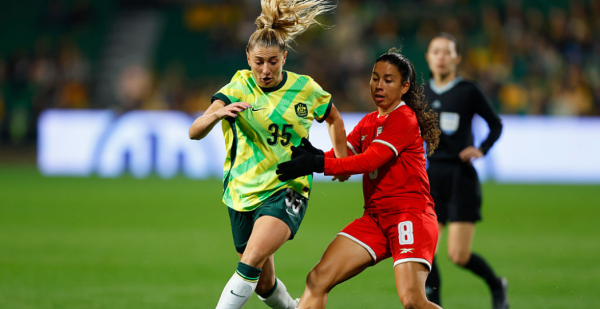 PERTH, AUSTRALIA - JULY 08: Remy Siemsen of the Matildas and Schiandra González of Panama contest for the ball during the International Friendly match between Australia Matildas and Panama at HBF Park on July 08, 2025 in Perth, Australia. (Photo by James Worsfold/Getty Images)