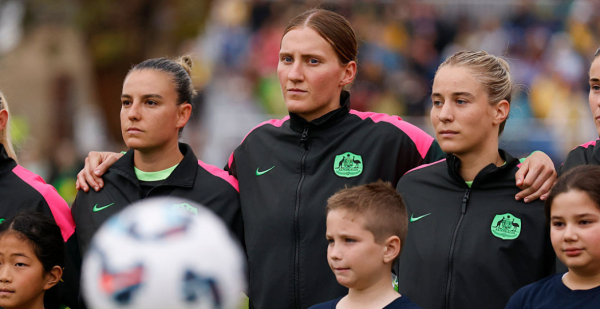 BUNBURY, AUSTRALIA - JULY 05: Natasha Prior of the Matildas looks at the game ball as she lines up for the national anthems during the International Friendly match between Australia Matildas and Panama at Hands Oval on July 05, 2025 in Bunbury, Australia. (Photo by James Worsfold/Getty Images)