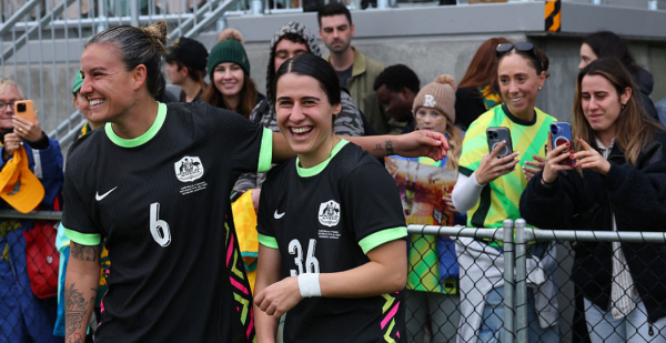 BUNBURY, AUSTRALIA - JULY 05: Chloe Berryhill and Adriana Taranto of Australia share a moment following the International Friendly match between the Australia Matildas and Panama at Hands Oval on July 05, 2025 in Bunbury, Australia. (Photo by Paul Kane/Getty Images)