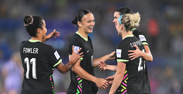 GOLD COAST, AUSTRALIA - MARCH 05: Amy Sayer of Australia celebrates with teammates after scoring the teams first goal during the AFC Women's Asian Cup Australia 2026 match between Islamic Republic of Iran and Australia Matildas at Gold Coast Stadium on March 05, 2026 in Gold Coast, Australia. (Photo by Albert Perez/Getty Images)