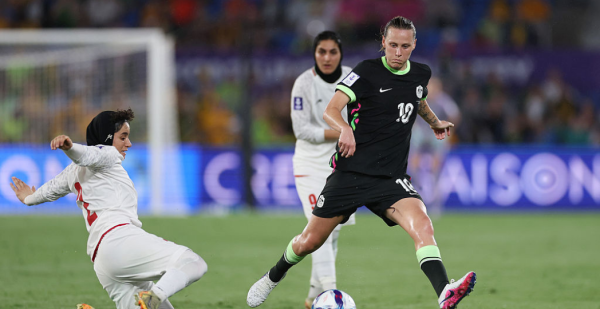GOLD COAST, AUSTRALIA - MARCH 05: Emily van Egmond of Australia is put under pressure by Atefeh Imani of Islamic Republic of Iran during the AFC Women's Asian Cup Australia 2026 match between Islamic Republic of Iran and Australia Matildas at Gold Coast Stadium on March 05, 2026 in Gold Coast, Australia. (Photo by Cameron Spencer/Getty Images)