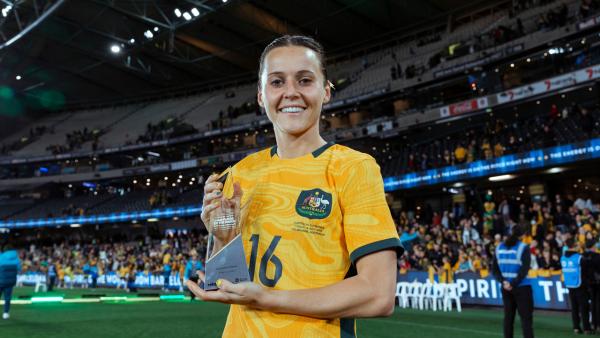Hayley Raso is presented with the rebel sport Player Of The Match for #AUSvFRA