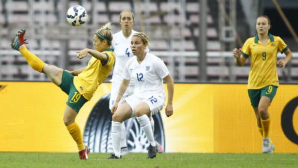 Katrina Gorry performs an overhead kick when the Matildas played England in October 2015.