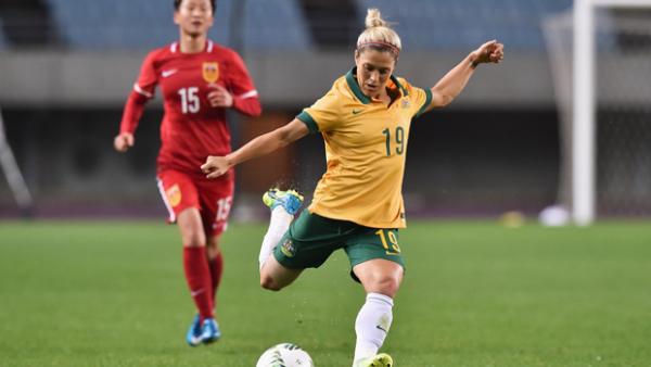 Katrina Gorry fires a shot on goal against China in Olympic Qualifying.