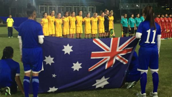 The Mini Matildas sing the national anthem ahead of kick-off against Vietnam.