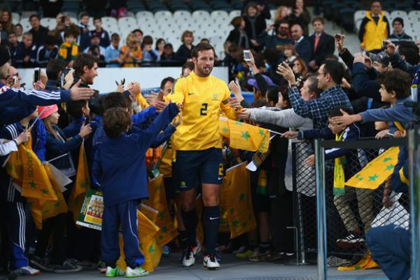 Confident Socceroos touch down in Melbourne