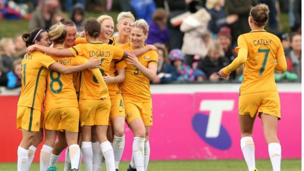 Steph Catley joins her Westfield Matildas teammates to celebrate a goal against New Zealand in a friendly.