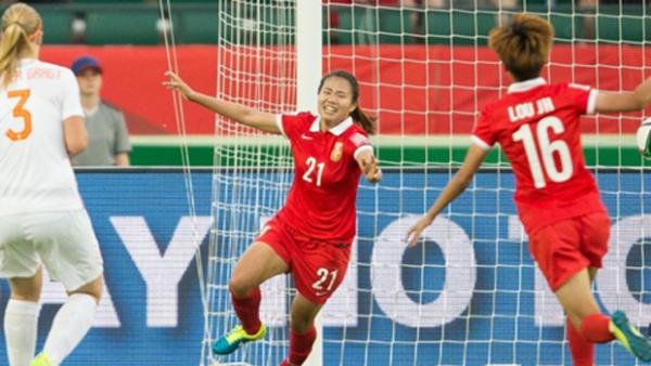 China midfielder Wang Lisi celebrates scoring the winner against the Dutch.