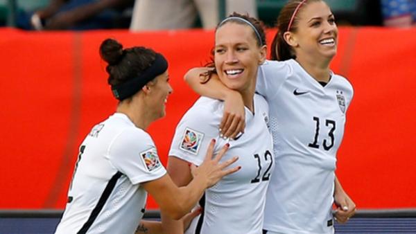 USA players celebrate a goal in their 2-0 win over Colombia.