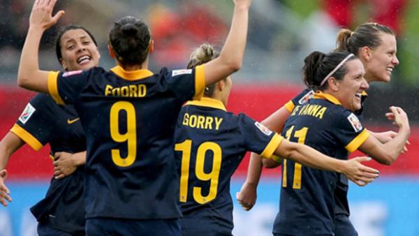 Matildas players celebrate a goal at the 2015 FIFA World Cup in Canada.