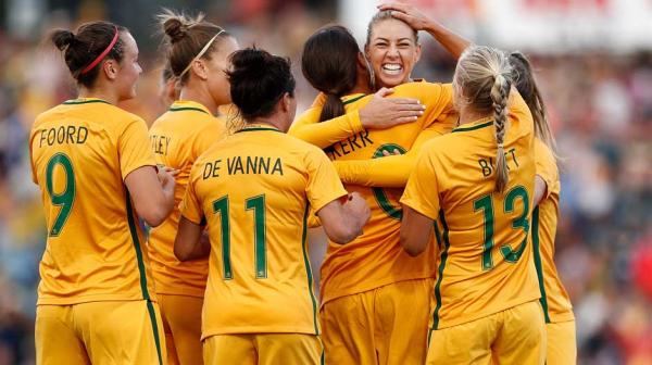 The Westfield Matildas celebrate a goal.