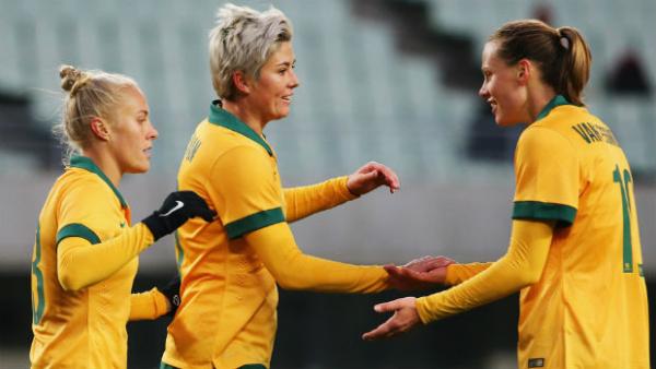 Westfield Matildas Michelle Heyman, Emily van Egmond and Tameka Butt celebrate a goal against Vietnam.