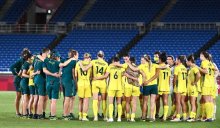Australia's players gather in a huddle after their loss during the Tokyo 2020 Olympic Games women's semi-final football match between Australia and Sweden at Yokohama International Stadium in Yokohama on August 2, 2021. (Photo by Anne-Christine POUJOULAT / AFP) (Photo by ANNE-CHRISTINE POUJOULAT/AFP via Getty Images)