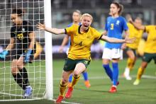 Clare Polkinghorne celebrates against Brazil 