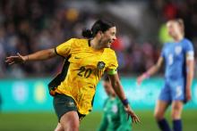 Sam Kerr of Australia celebrates after scoring the team's first goal during the Women's International Friendly match between England and Australia at Gtech Community Stadium on April 11, 2023 in Brentford, England. (Photo by Ryan Pierse/Getty Images)