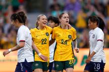MELBOURNE, AUSTRALIA - DECEMBER 04: Sharn Freier of Australia celebrates with team mates after scoring a goalduring the International Friendly match between Australia Matildas and Chinese Taipei at AAMI Park on December 04, 2024 in Melbourne, Australia. (Photo by Daniel Pockett/Getty Images)