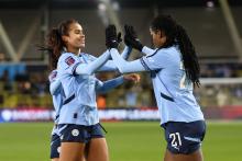 MANCHESTER, ENGLAND - FEBRUARY 16: Khadija Shaw of Manchester City celebrates scoring her team's first goal with teammate Mary Fowler during the Barclays Women's Super League match between Manchester City FC and Liverpool FC at Joie Stadium on February 16, 2025 in Manchester, England. (Photo by Matt McNulty/Getty Images)