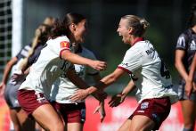 WELLINGTON, NEW ZEALAND - MARCH 02: Ella Tonkin of Adelaide United celebrates with Matilda McNamara after scoring a goal during the round 17 A-League Women's match between Wellington Phoenix and Adelaide United at Porirua Park, on March 02, 2025, in Wellington, New Zealand. (Photo by Hagen Hopkins/Getty Images)