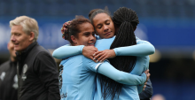 LONDON, ENGLAND - MAY 10: Mary Fowler, Jade Rose and Khadija Shaw of Manchester City embrace at full time following victory during the Adobe Women's FA Cup Semi Final match between Chelsea and Manchester City at Stamford Bridge on May 10, 2026 in London, England. (Photo by Jasper Wax/Getty Images)