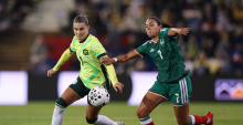NEWCASTLE, AUSTRALIA - JUNE 06: Steph Catley of Australia and Maria Sanchez of Mexico compete for the ball during the women's international friendly match between Australia Matildas and Mexico at McDonald Jones Stadium on June 06, 2026 in Newcastle, Australia. (Photo by Cameron Spencer/Getty Images)